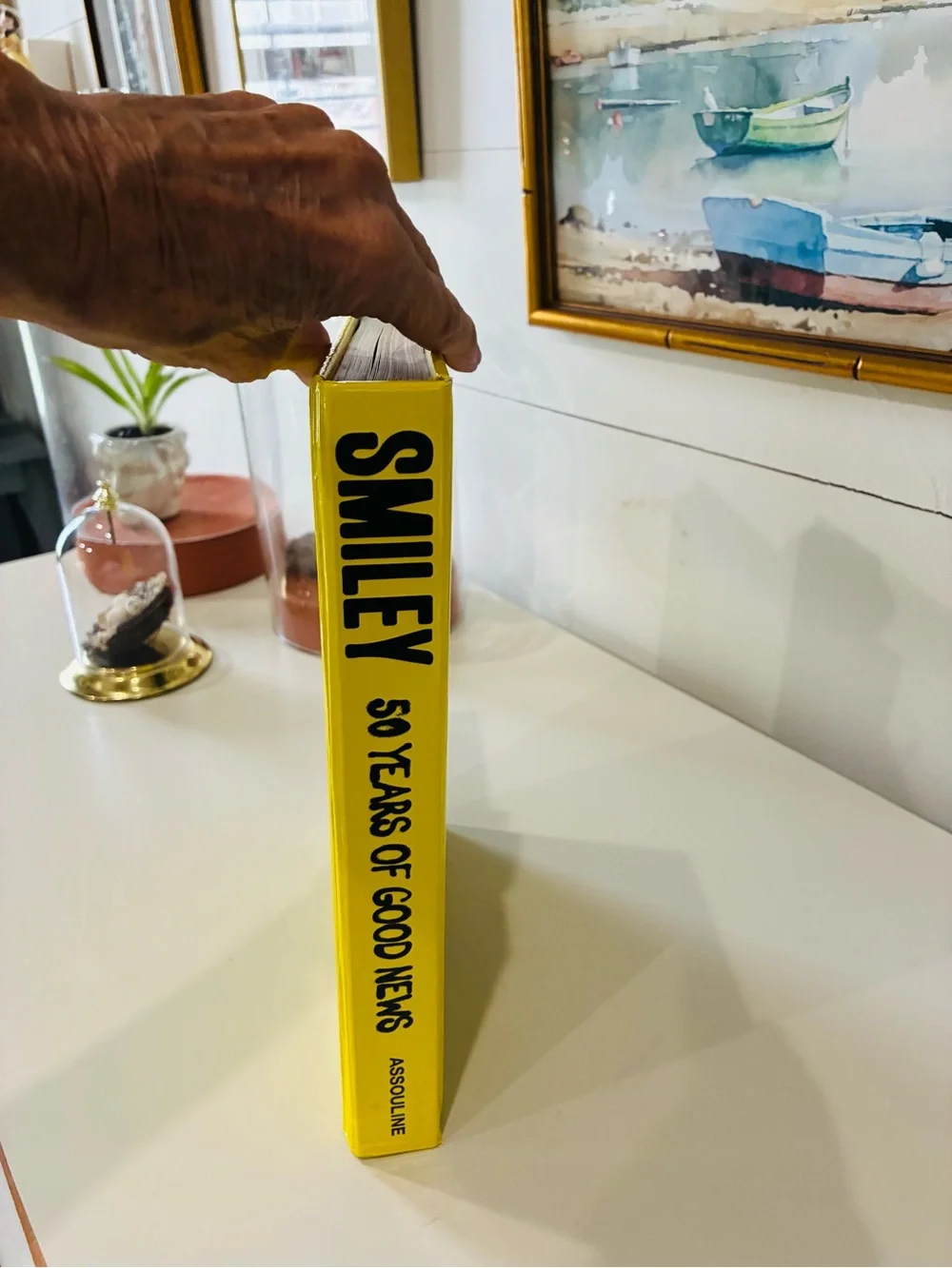 ✨ Brighten up your home with this stunning, vibrant yellow Assouline pop-culture